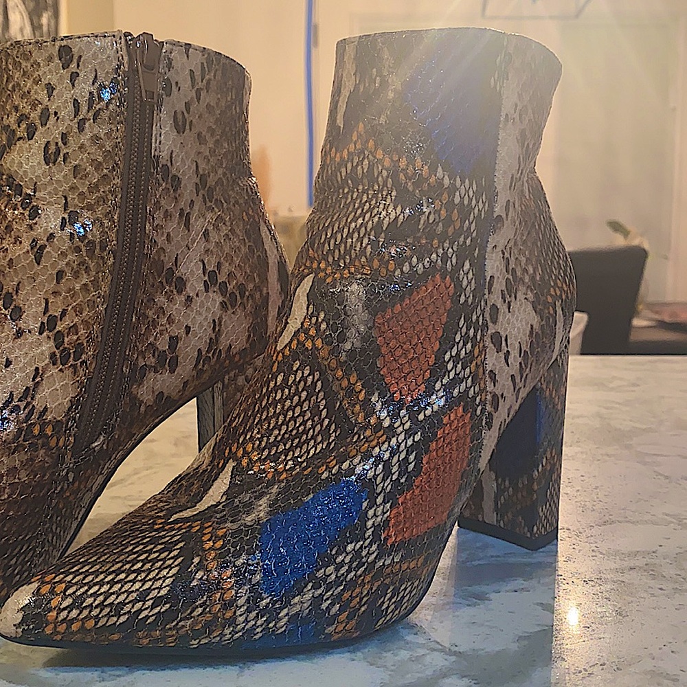 Snake skin pointy ankle booties